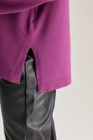 بلوزة محبوكة بقصة واسعة