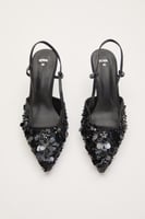 حذاء ترتر مفتوح من الخلف