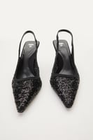 حذاء مزين بالترتر بكعب