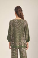 بلوزة محبوكة مزينة بنقوش