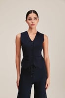 جاكيت بلا أكمام بأزرار إغلاق