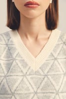 بلوزة بلا أكمـام بنقوش هندسية