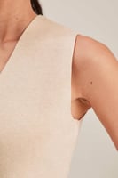 جاكيت بلا أكمام بأزرار إغلاق