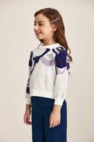 كنزة موردة بتفاصيل الترتر