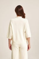 بلوزة مزينة بخيوط