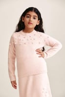 كنزة مزينة بالترتر