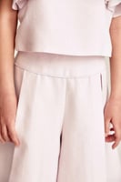 بلوزة بأكمام كشكش