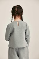 بلوزة مزينة بالكريستال