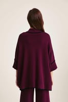 بلوزة واسعة بجيوب