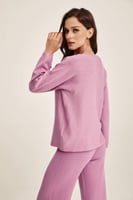 بلوزة مزينة بالخرز اللامع