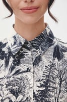 قميص واسع بنقوش موردة