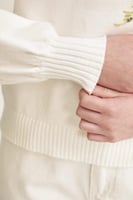 بلوزة محبوكة مزينة بالخرز