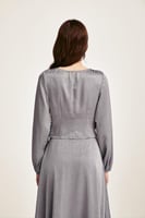 بلوزة فضفاضة درابية