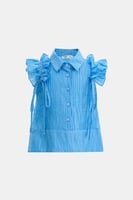 بلوزة بأكمام كشكش