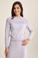 كنزة بتفاصيل لامعة