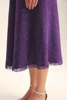 تنورة كلوش بحواف هدب