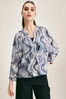 بلوزة فضفاضة بنقوش مموجة