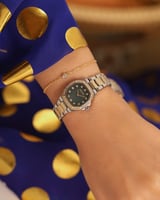 ‎ ساعة نسائيه اليتير بسير ستيل بلون فضي وذهبي | TO...