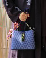 ‎ شنطة نسائية إمزوري بلون أزرق