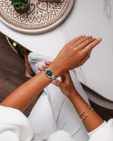 ساعة نسائية إمزوري ستيل بلون فضي وذهبي