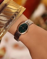 ساعة نسائية إمزوري ستيل بلون فضي وذهبي