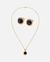 ‎ طقم نسائي أنيق باللون الذهبي