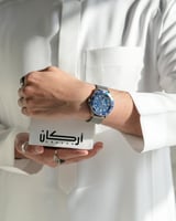 ‎ ساعة رجالية زايروس بسير شبكي رمادي