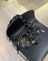 ‎ شنطة نسائية أنيقة بلون أسود