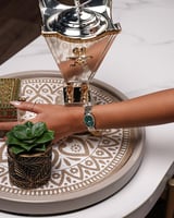 ساعة نسائية إمزوري ستيل بلون فضي وذهبي