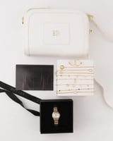 هدية نسائية إمزوري شنطة وساعة واكسسوارات