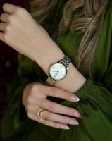 ‎ ساعة نسائية إمزوري بسير ستيل بلون فضي وذهبي