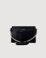 ‎ شنطة نسائية من الجلد باللون الأسود