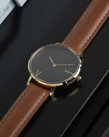 ‎ ساعة نسائية آن بسير جلد