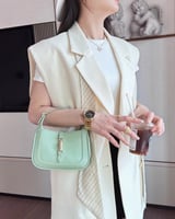 شنطة نسائية من الجلد بلون أخضر