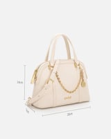 شنطة نسائية من الجلد بتصميم مميز بلون بيج