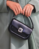 ‎ شنطة نسائية الفي اند كو باللون الأسود