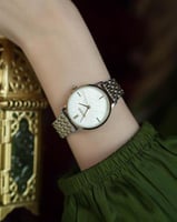 ‎ ساعة نسائية إمزوري بسير ستيل بلون فضي وذهبي