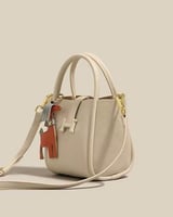 ‎ شنطة نسائية من الجلد بلون أبيض | MLH002F4444