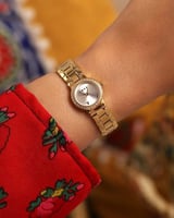 ‎ ساعة نسائية من آن باللون الذهبي | NOS008L011101