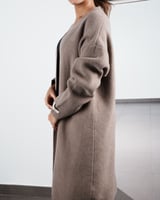 ‎ كوت نسائي عصري باللون البني