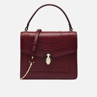 ‎ شنطة زايروس النسائية من الجلد باللون العودي بتصم...