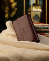 ‎ شنطة نسائية من الفي بلون عودي