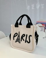 ‎ شنطة نسائية من القماش بلون بيج