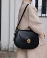 ‎ شنطة نسائية من الجلد بلون أسود | MLH057F0201