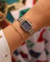 ‎ ساعة نسائيه اليتير ستيل بلون فضي وذهبي | TAS009L...