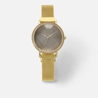 ‎ ساعة زايروس نسائية ذهبية بسوار شبكي وميناء أخضر...