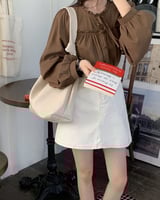 ‎ شنطة نسائية من الجلد بلون أبيض