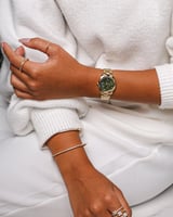 ‎ ساعة نسائية بسير ستيل باللون الذهبي