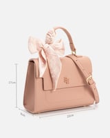 ‎ شنطة نسائية من الفي بلون وردي