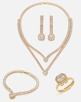 ‎ طقم نسائي كلاسيك باللون الذهبي